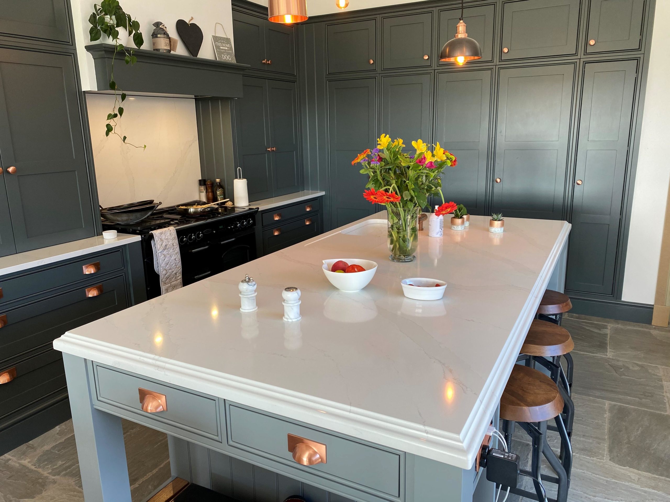 A cottage-style kitchen with copper accents