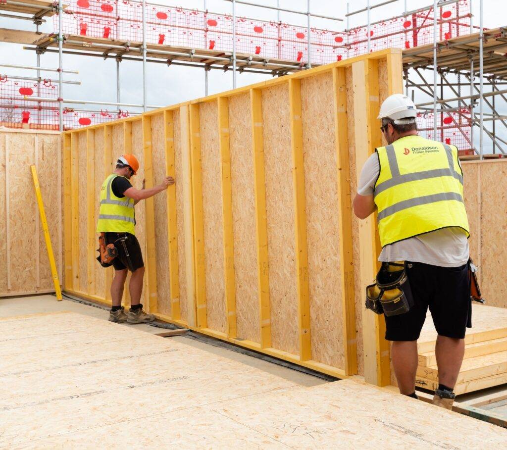 Two Donaldson Group Employees installing walls on a residential build